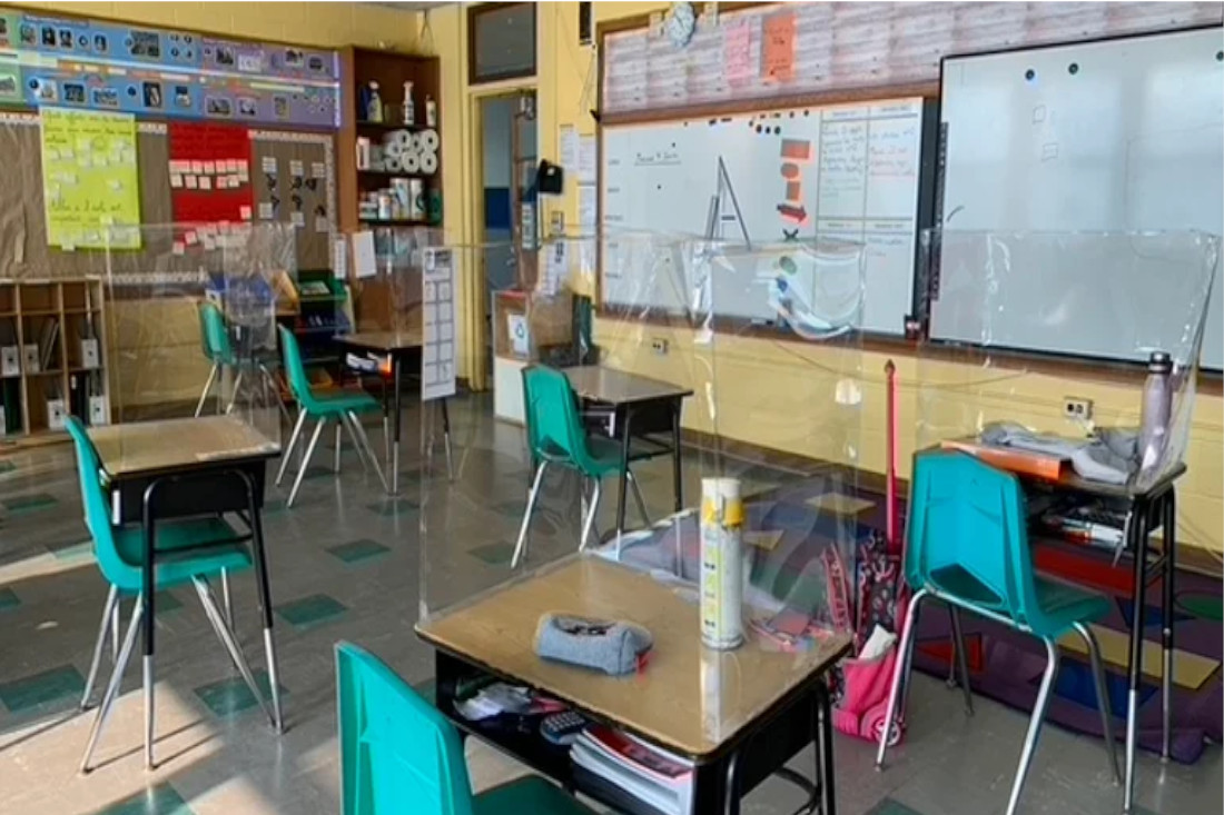 Health Shield on Desks in Classroom